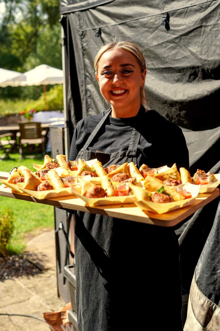 Canapes being served on a tray at a garden wedding in Leicestershire
