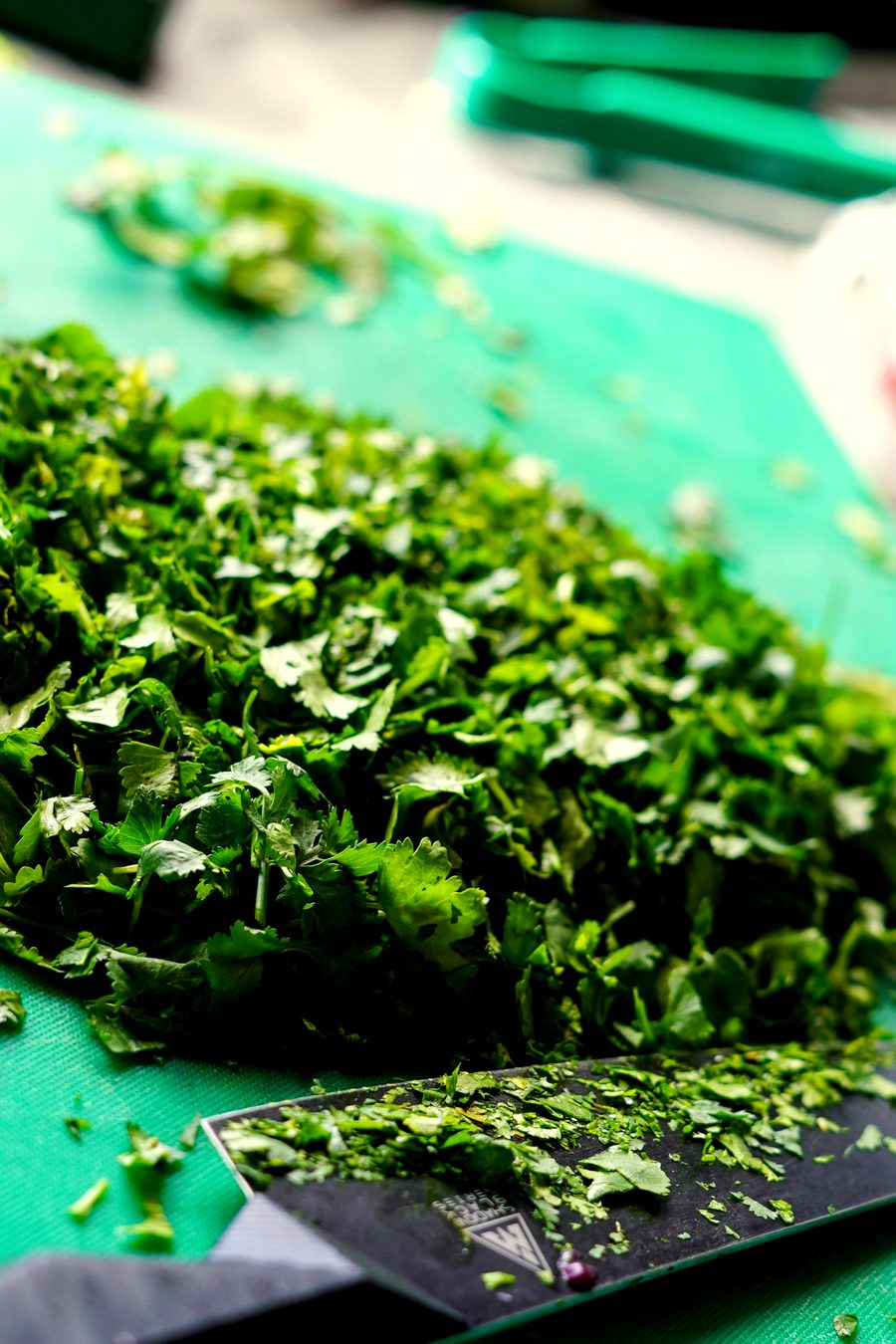Fresh coriander being prepared at a KoolKata street food station